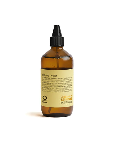 Brown bottle with black sprayer on a white background