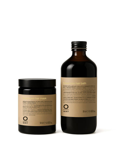 Oway hair mask jar and hair bath bottle on a white background